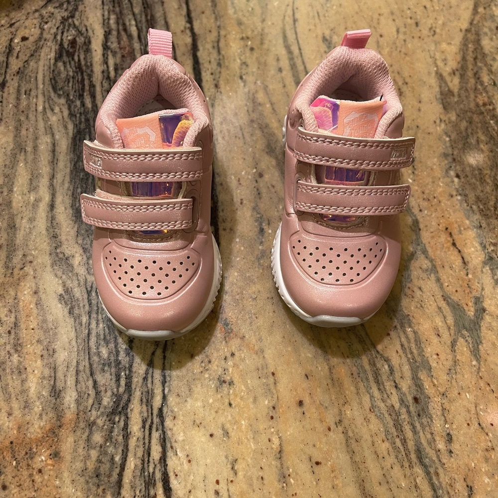 Pink sneakers with star on the side . European size 20